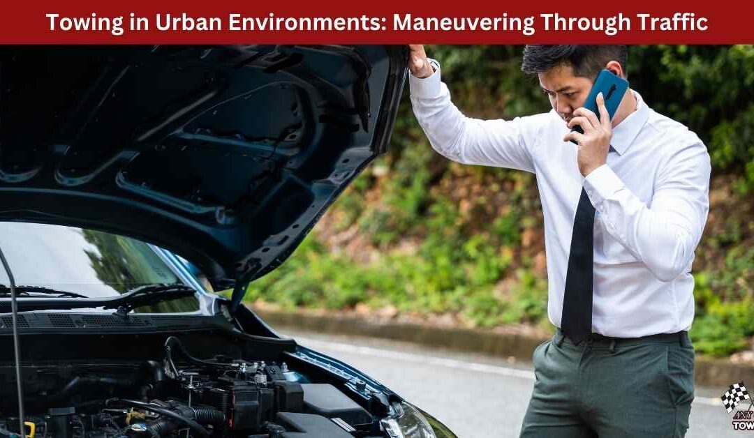 Towing in Urban Environments: Maneuvering Through Traffic